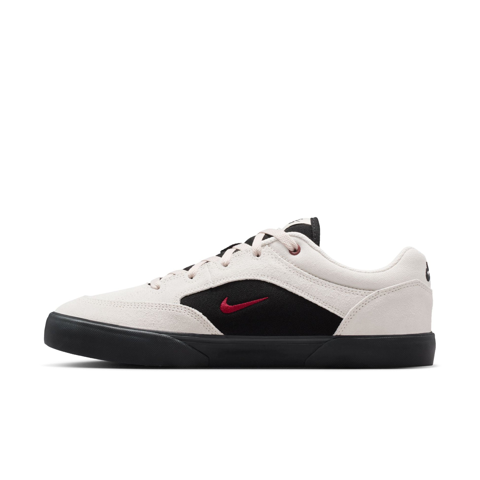 White sneaker with black and red accents on a white background