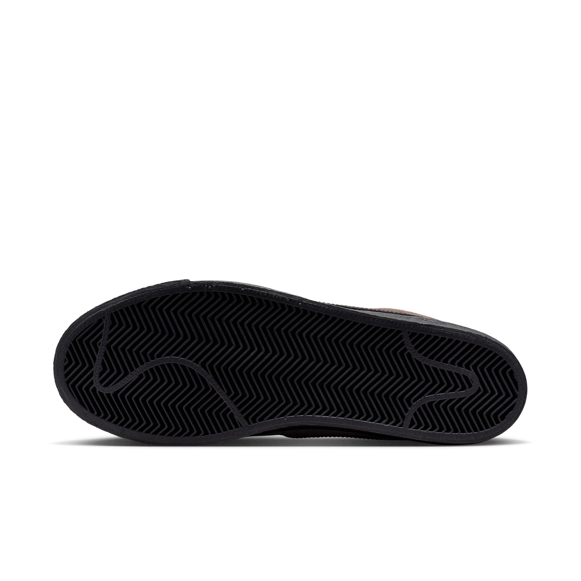 Black sneaker sole on a white background