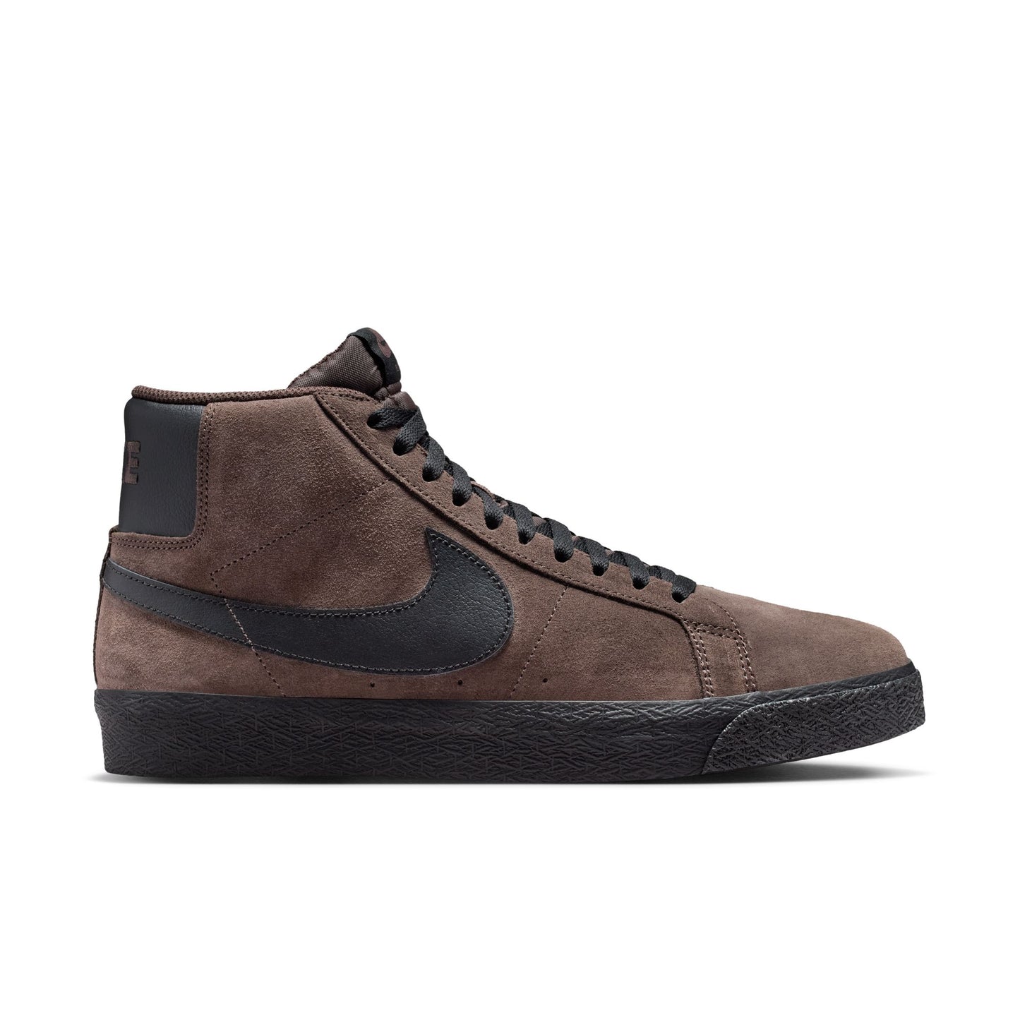 Brown suede sneaker with black accents on a white background