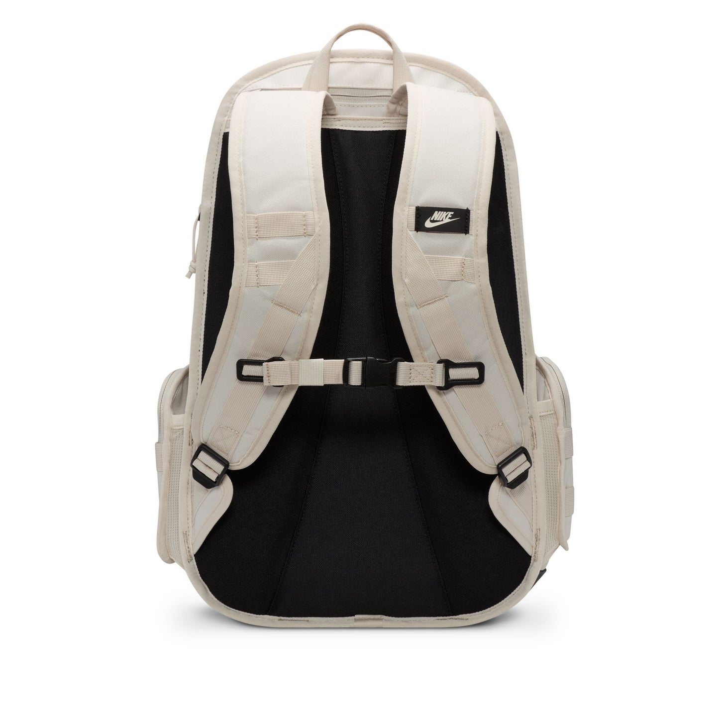 Beige backpack with black interior and Nike logo on a white background