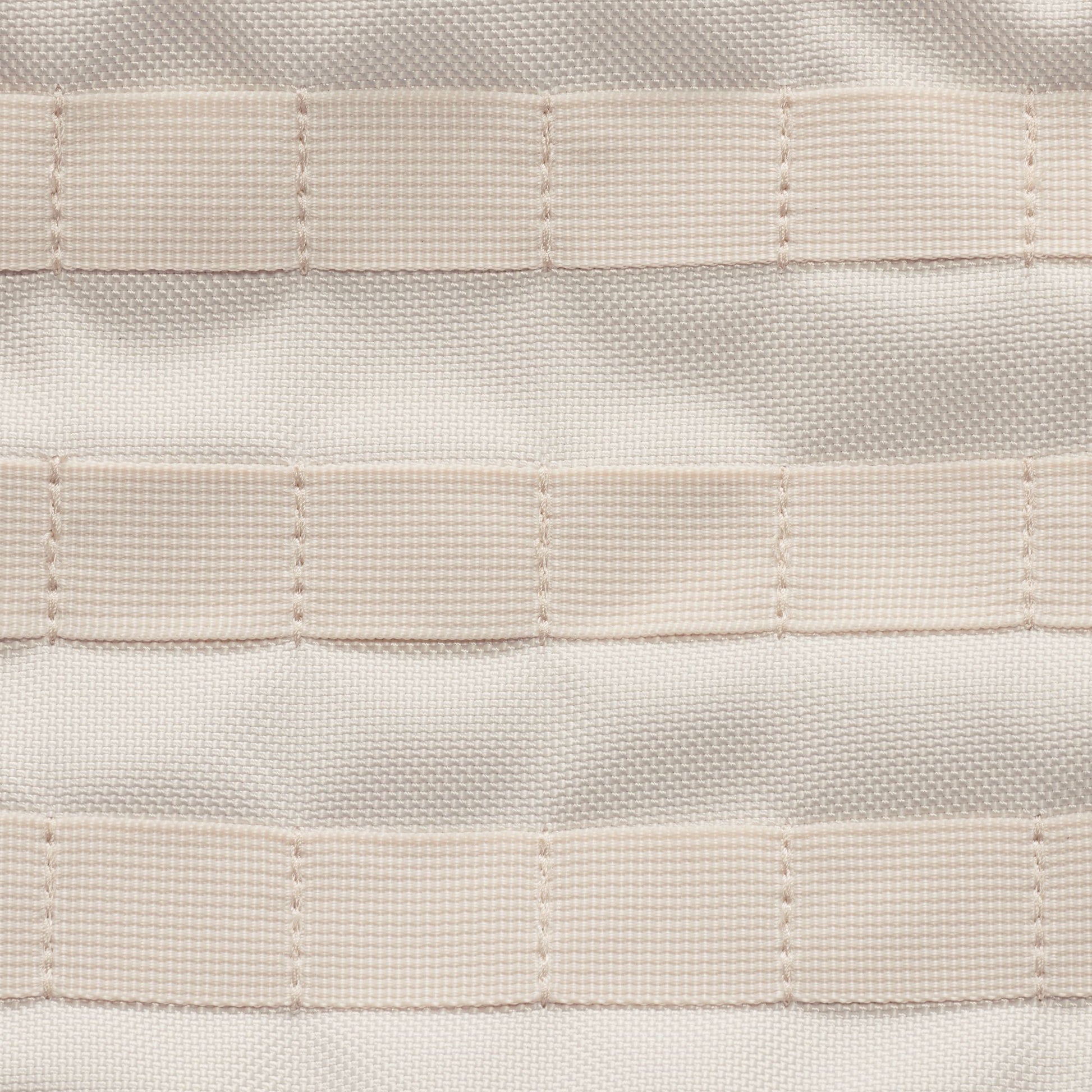 Close-up of woven fabric with horizontal stripes in beige and gray tones.