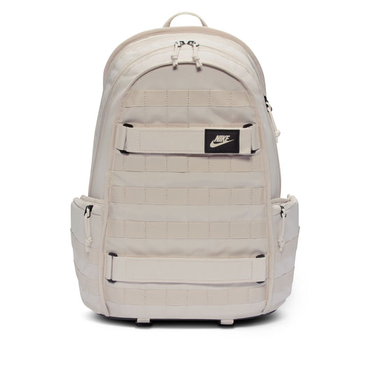 Beige backpack with Nike logo on a white background