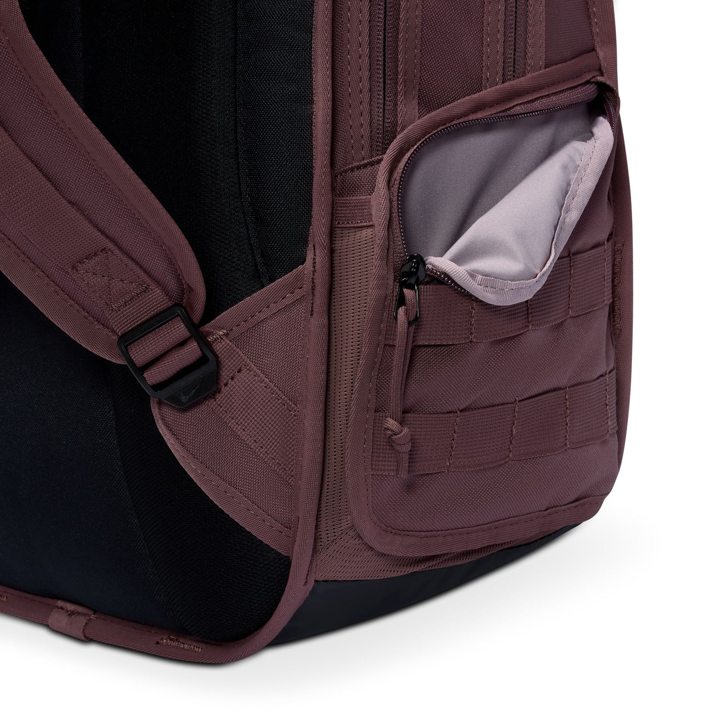 Close-up of a backpack with a pocket and strap on a white background