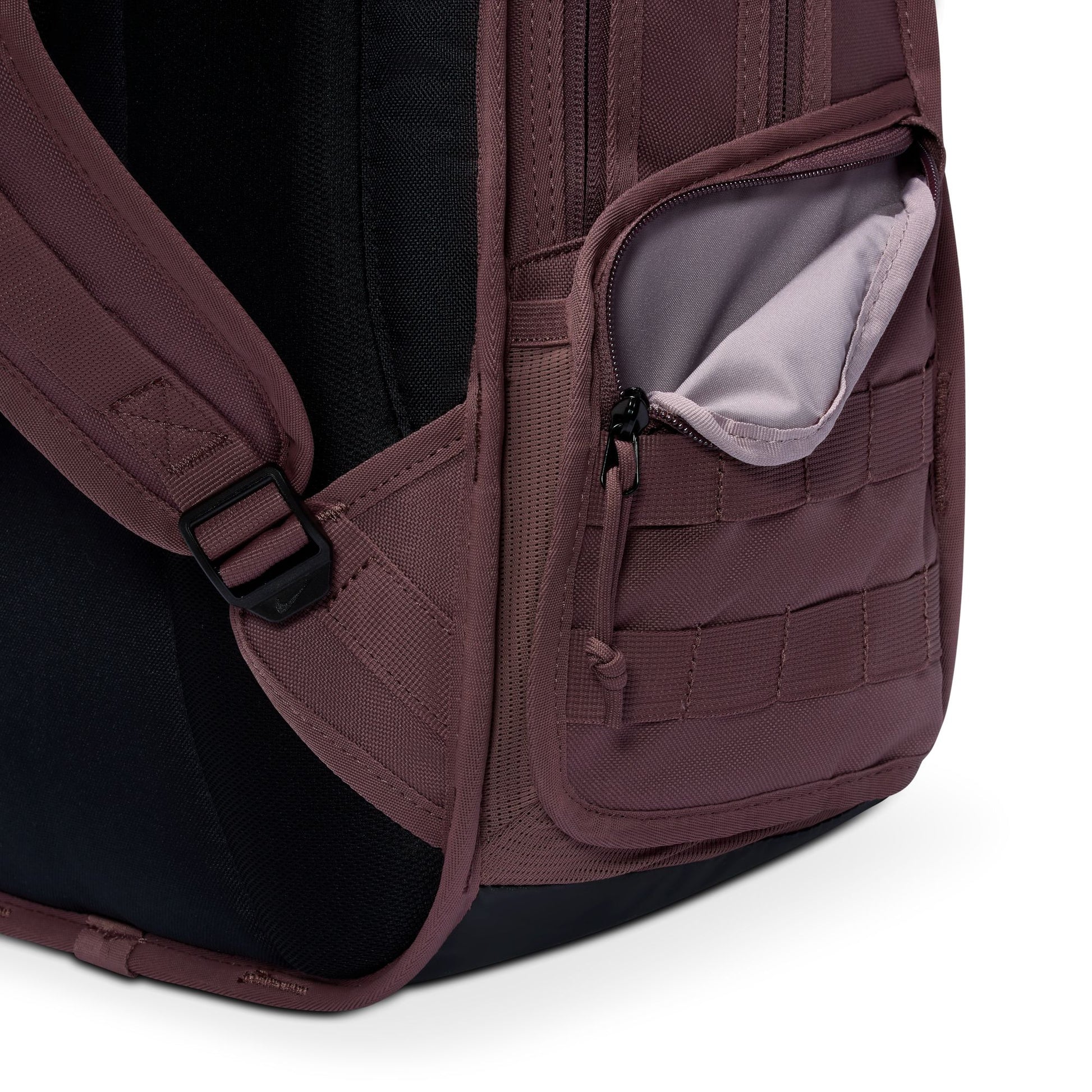 Close-up of a backpack with a pocket and strap on a white background