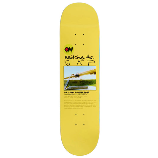 Yellow skateboard deck with text and a graphic on a white background