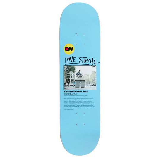 Blue skateboard deck with text and graphics on a white background