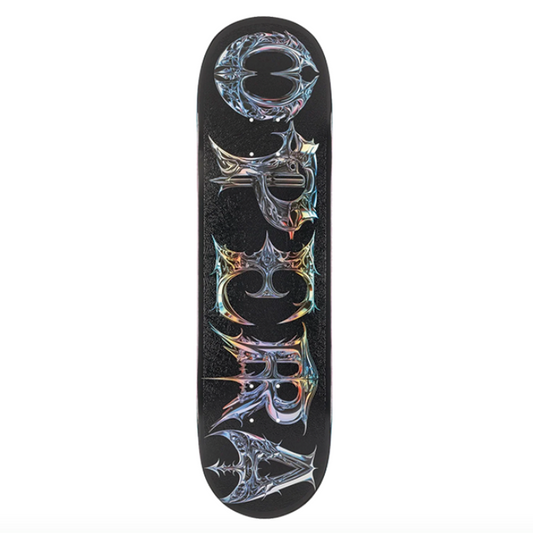 Skateboard deck with a colorful geometric design on a white background