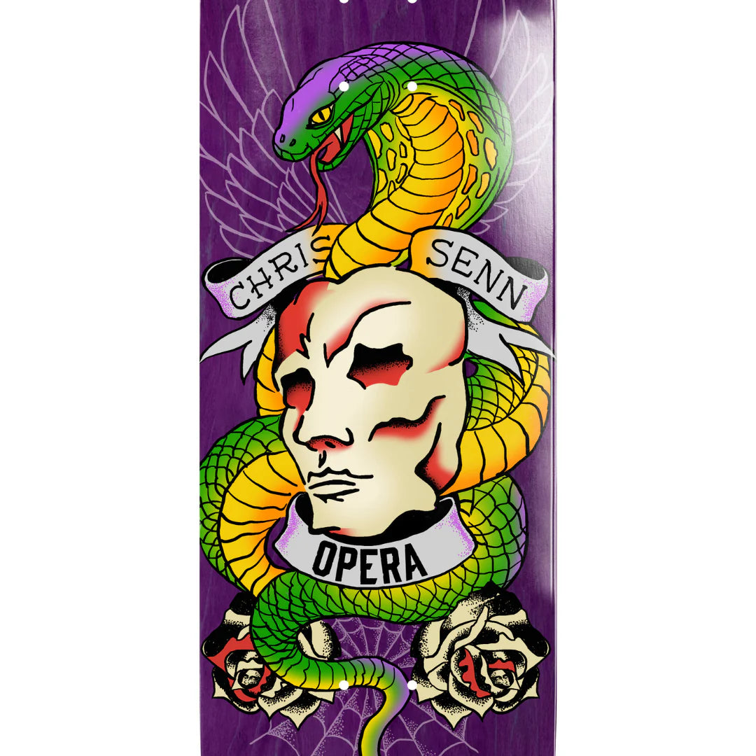 Skateboard deck with a design of a skull, snake, and roses on a purple background.
