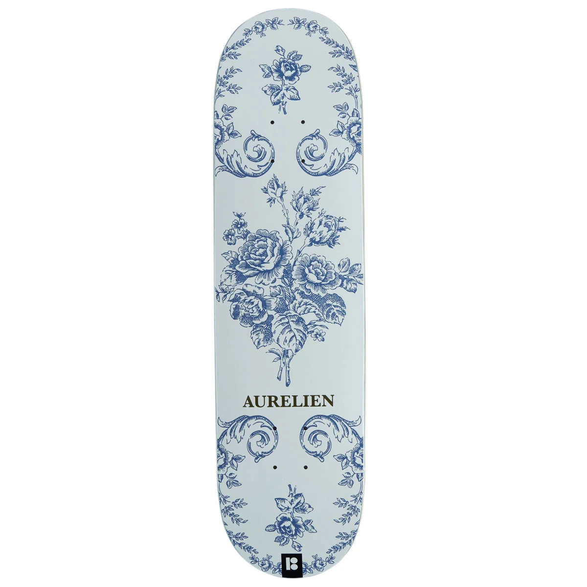 A skateboard deck with a light blue background and a blue floral toile-style pattern, featuring the brand name 'AURELIEN' printed in black near the bottom.