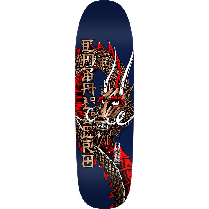 Skateboard deck with a dragon design on a blue background