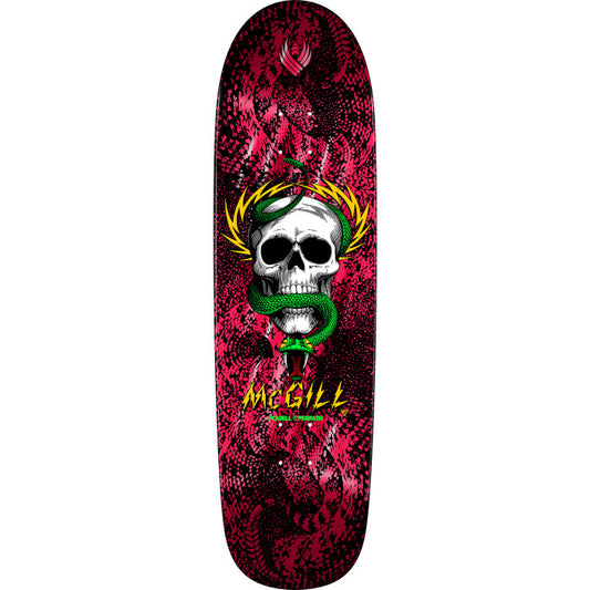 Skateboard deck with a skull and snake design on a red and black background