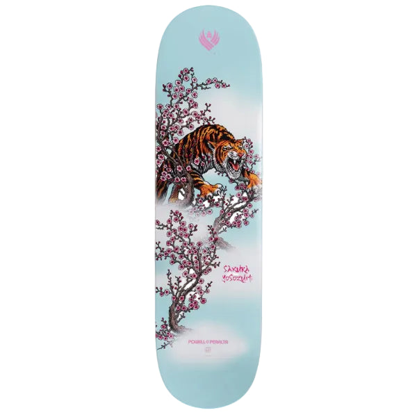 Skateboard deck with a tiger and cherry blossom design on a light blue background