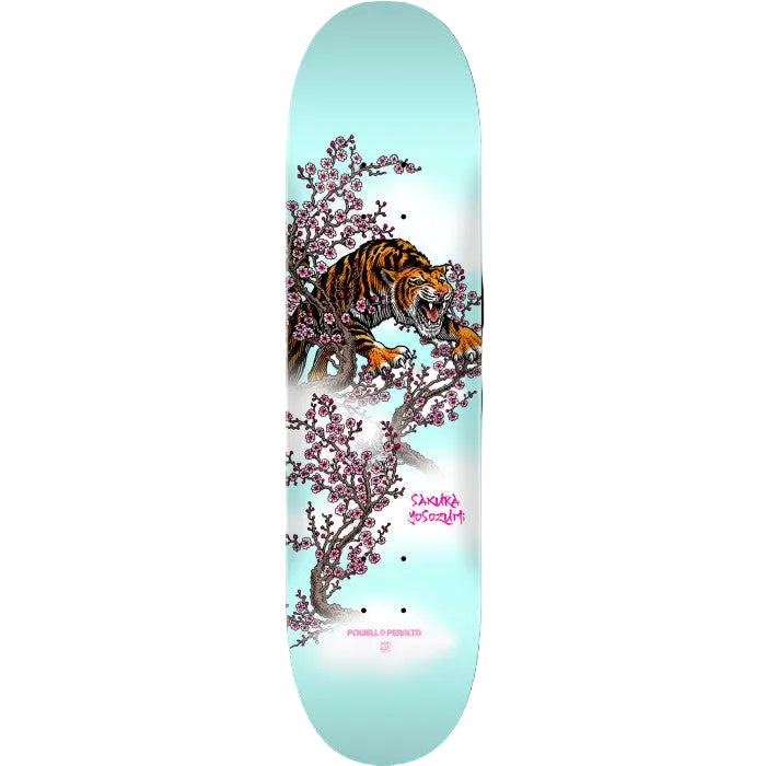 Skateboard deck with a tiger and cherry blossom design on a light blue background