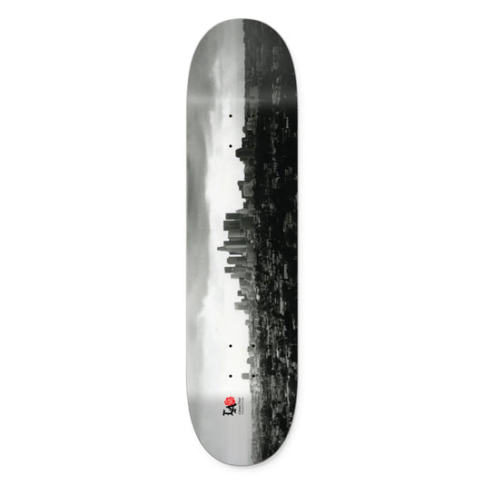 Skateboard deck with a cityscape design on a white background