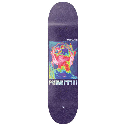 Skateboard deck with colorful abstract design and 'Primitive' branding on a white background