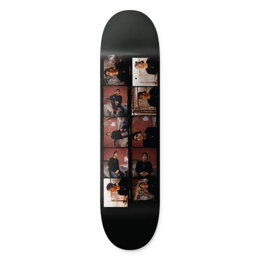 Black skateboard deck with multiple images of a person on a white background