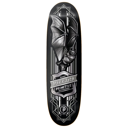 Black skateboard deck with bat design and Primitive branding on a white background