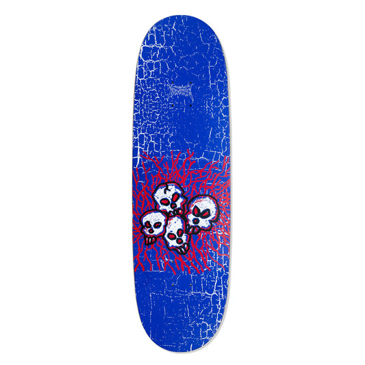 Skateboard deck with skull design on a blue cracked background