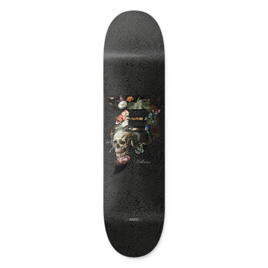 Skateboard deck with a skull and floral design on a black background
