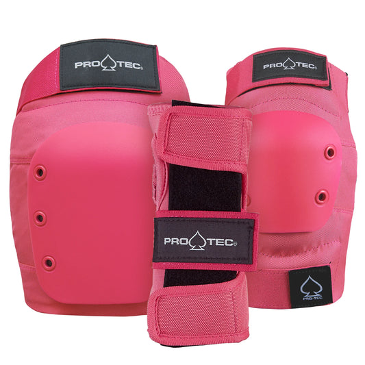 Pink knee pads and elbow pads with Pro-Tec branding on a white background