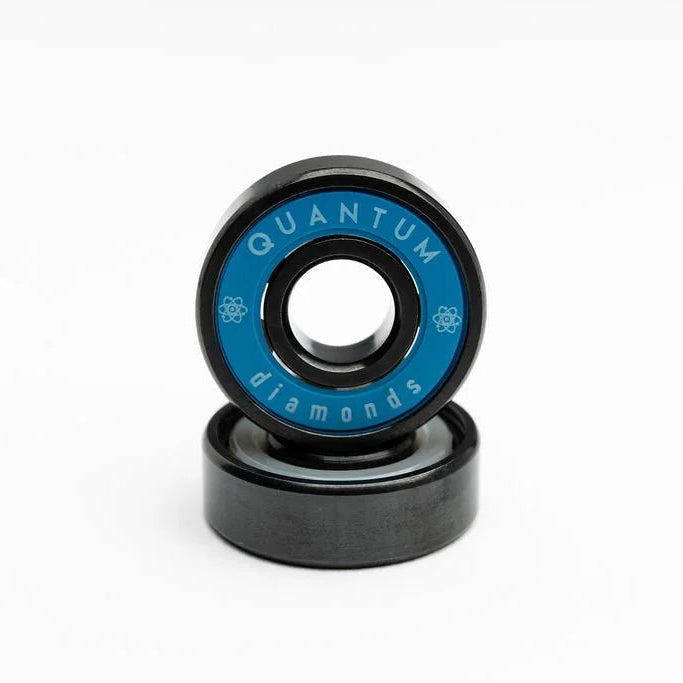 Two black and blue bearings with 'Quantum Diamonds' branding on a white background