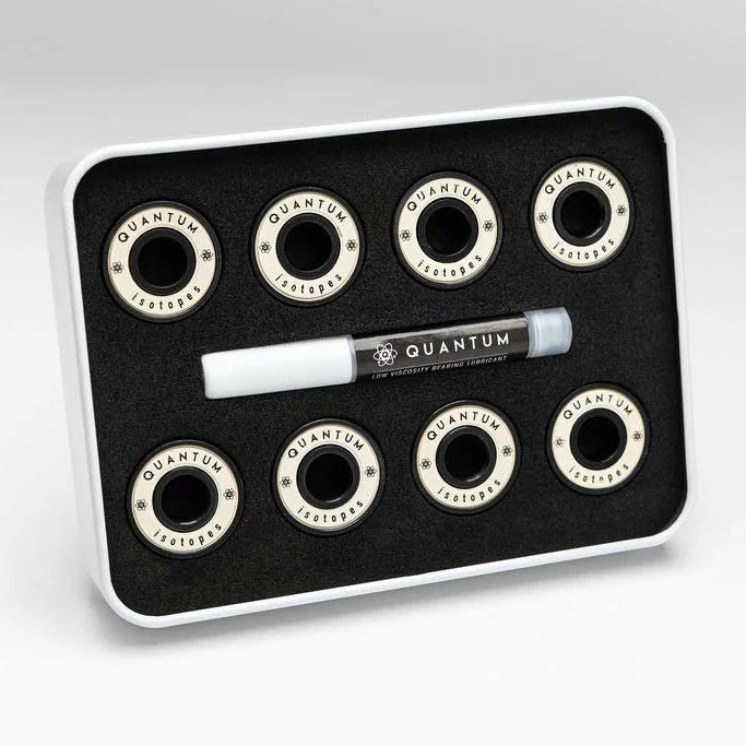 Set of Quantum bearings on a black tray with a white background
