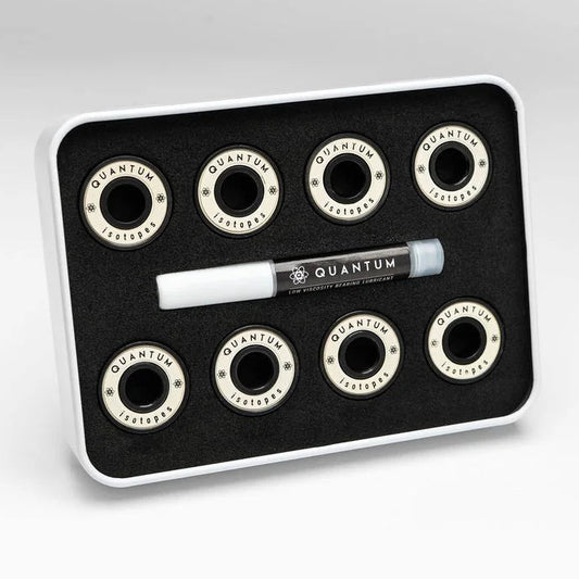 Set of Quantum bearings on a black tray with a white background
