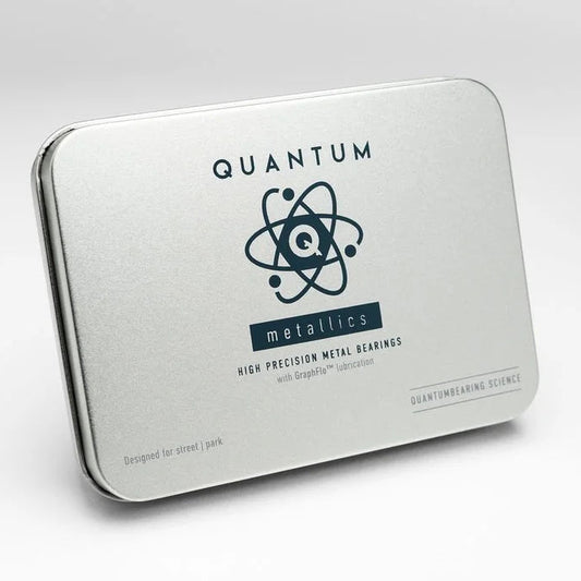 Silver packaging with 'Quantum Metallics' branding on a white background