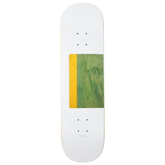 Skateboard deck with a green and yellow stripe on a white background