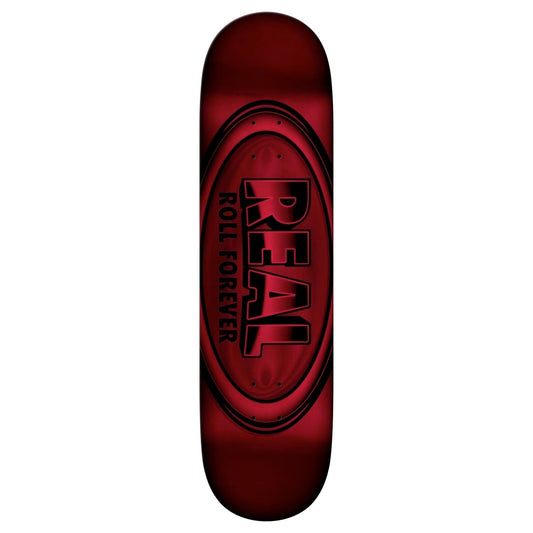 Red and black skateboard deck with 'Real' branding on a white background