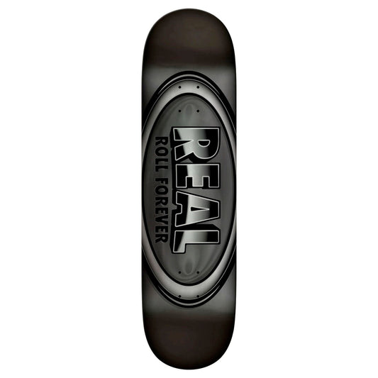 Black skateboard deck with 'Real' branding on a white background