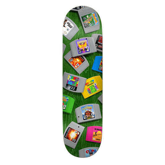 Skateboard deck with retro game cartridge design on a green background