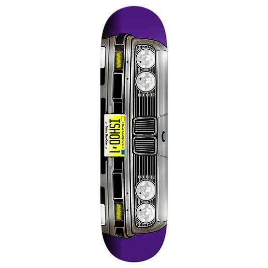 Skateboard deck with car headlight design and 'ISHOD' branding on a white background
