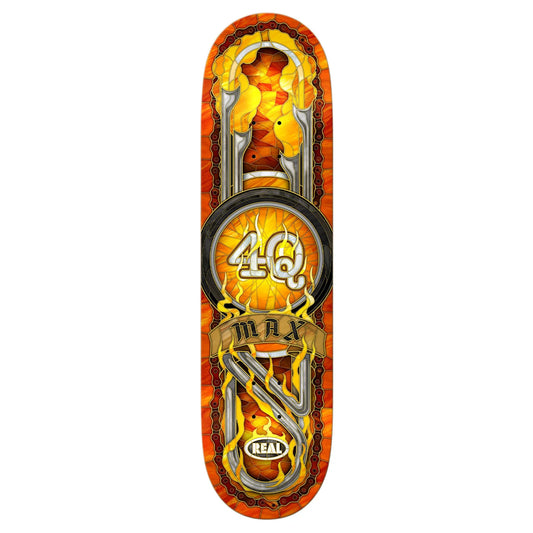 Skateboard deck with fiery design and 'Real' branding on a white background