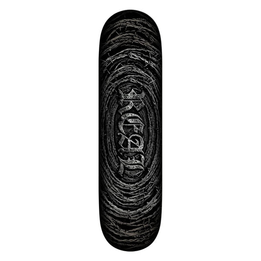 A skateboard deck shown vertically against a plain white background, featuring a black graphic design with a stylized central logo and swirling textured lines.