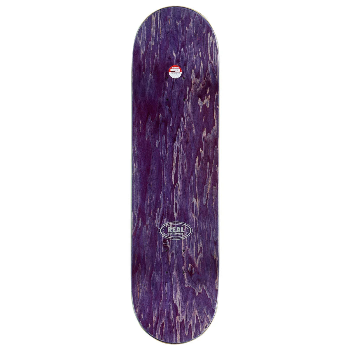 A skateboard deck with a dark purple woodgrain finish, featuring a circular Real brand logo near the bottom center and a small sticker near the top, shown against a plain white background.