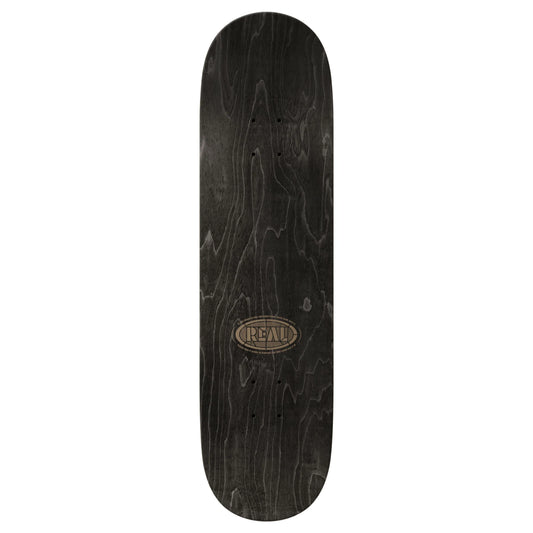 A dark wood skateboard deck with a black finish and prominent grain, featuring a circular 'REAL' brand logo in the center, shown against a plain white background.