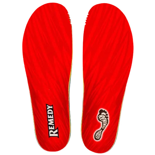 Red shoe insoles with 'Remedy' branding on a white background