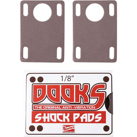 Two shock pads with a label indicating 'Dooks' brand on a white background