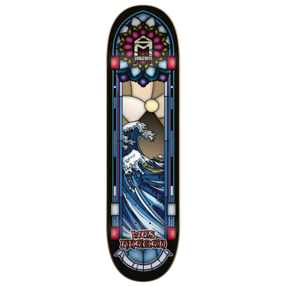 Skateboard deck with artistic design resembling stained glass, featuring a wave and colorful patterns.