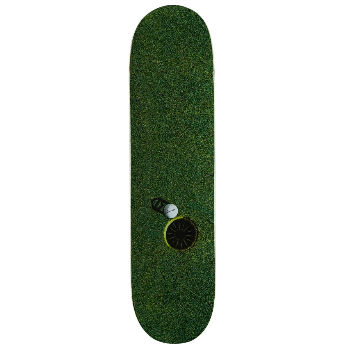 A skateboard deck featuring a dark green grass-textured graphic with a small golf-themed illustration near the center, shown against a plain white background.