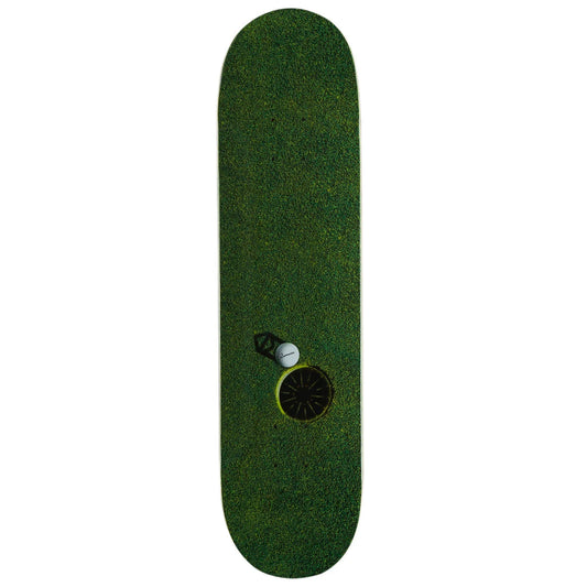 A skateboard deck featuring a dark green grass-textured graphic with a small golf-themed illustration near the center, shown against a plain white background.