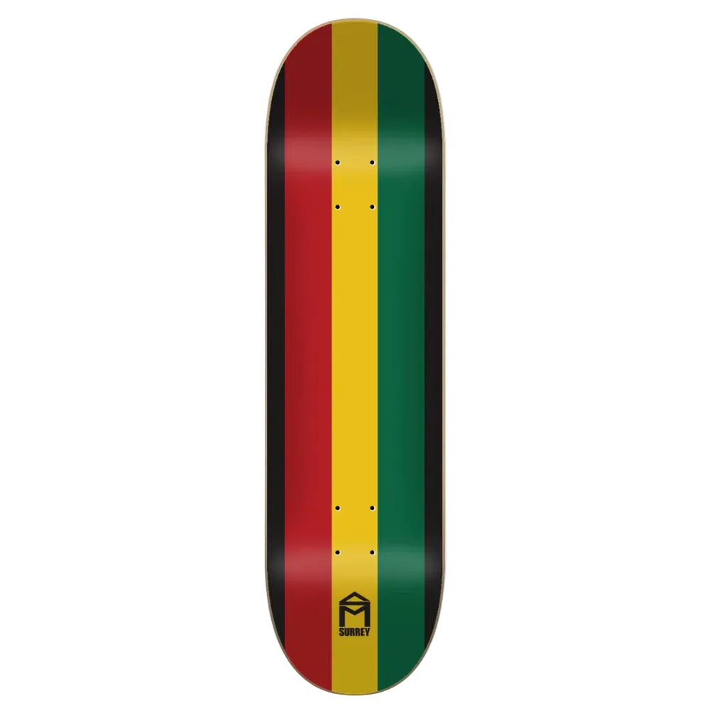 A skateboard deck shown vertically against a light gray background, featuring the Rastafarian flag colors of red, yellow, green, and black in vertical stripes, with a black logo at the bottom.