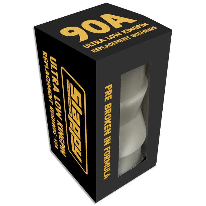 Black box packaging with yellow text and a clear window showing a product inside, on a white background.