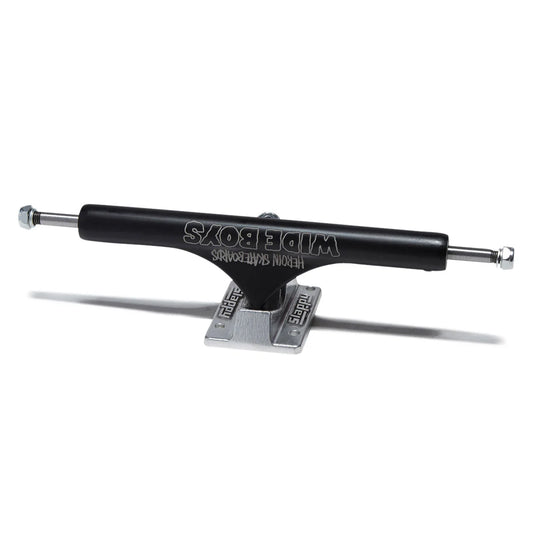 A single skateboard truck with a black metal horizontal arm and a silver metal baseplate, shown on a clean white background. The brand 'Wide Boys' is clearly printed on the black arm.