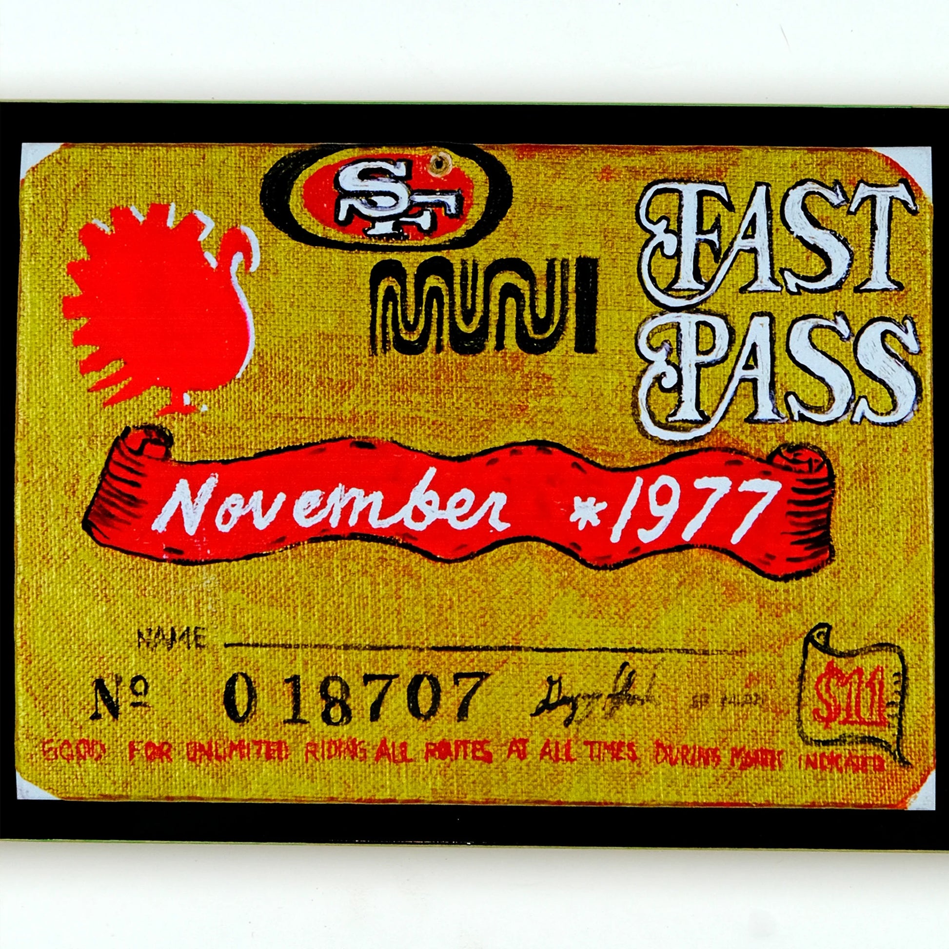 Vintage Muni Fast Pass from November 1977 with red and yellow design.