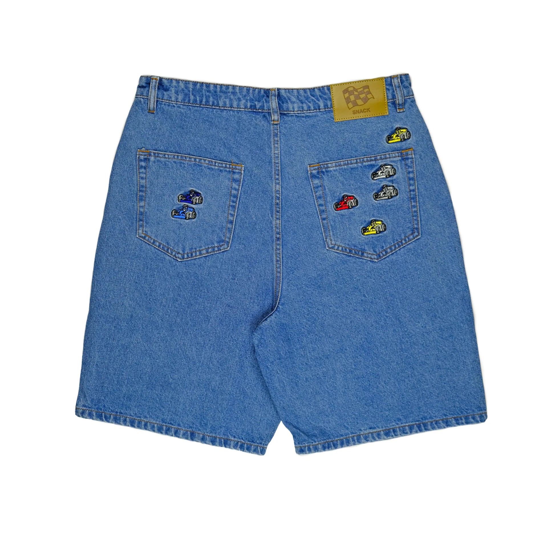 Blue denim shorts with embroidered designs on a white background