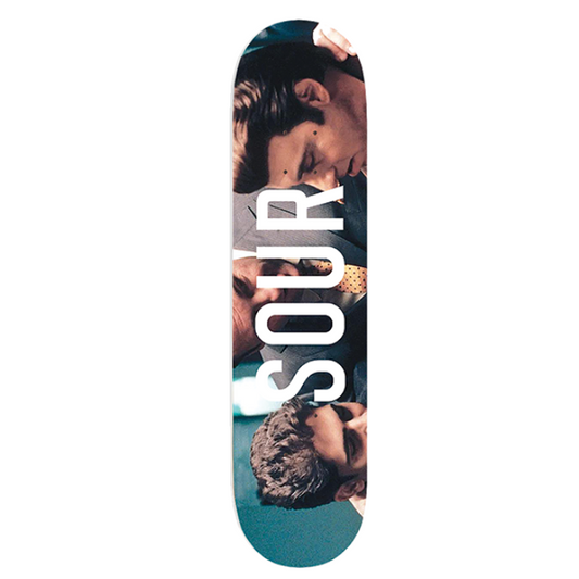 Skateboard deck with a colorful design and 'SOUR' branding on a white background