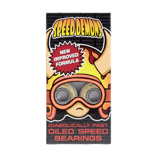 A tall rectangular product box for 'Speed Demons' oiled speed bearings, featuring a cartoon illustration of a horned character wearing goggles. The packaging has a black background with yellow, orange, and red graphics and text.