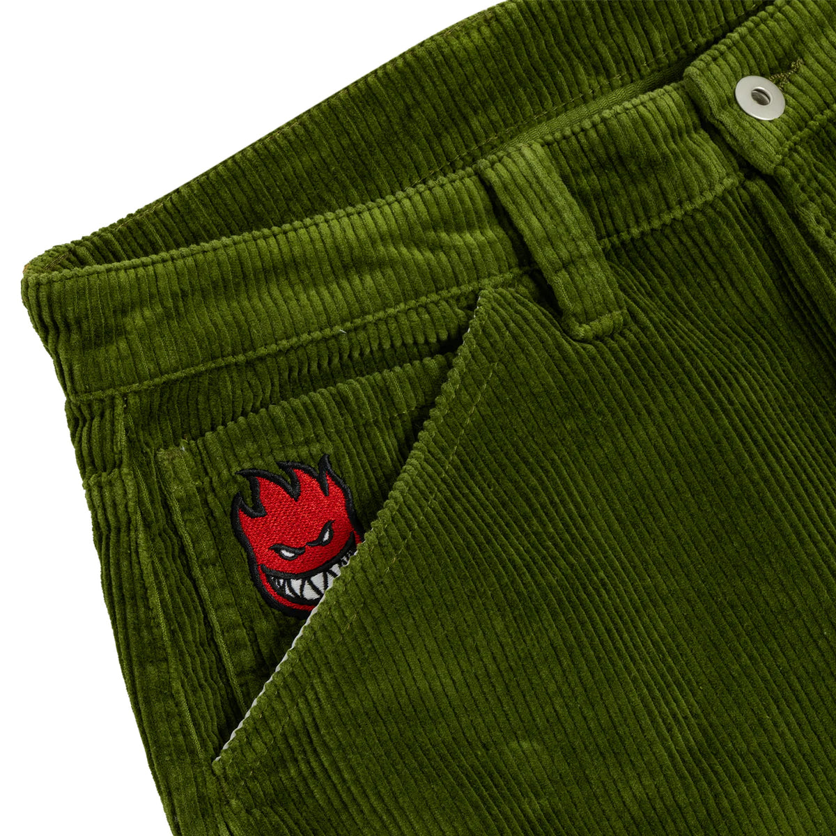 Green corduroy pants with a red and black embroidered logo on a white background